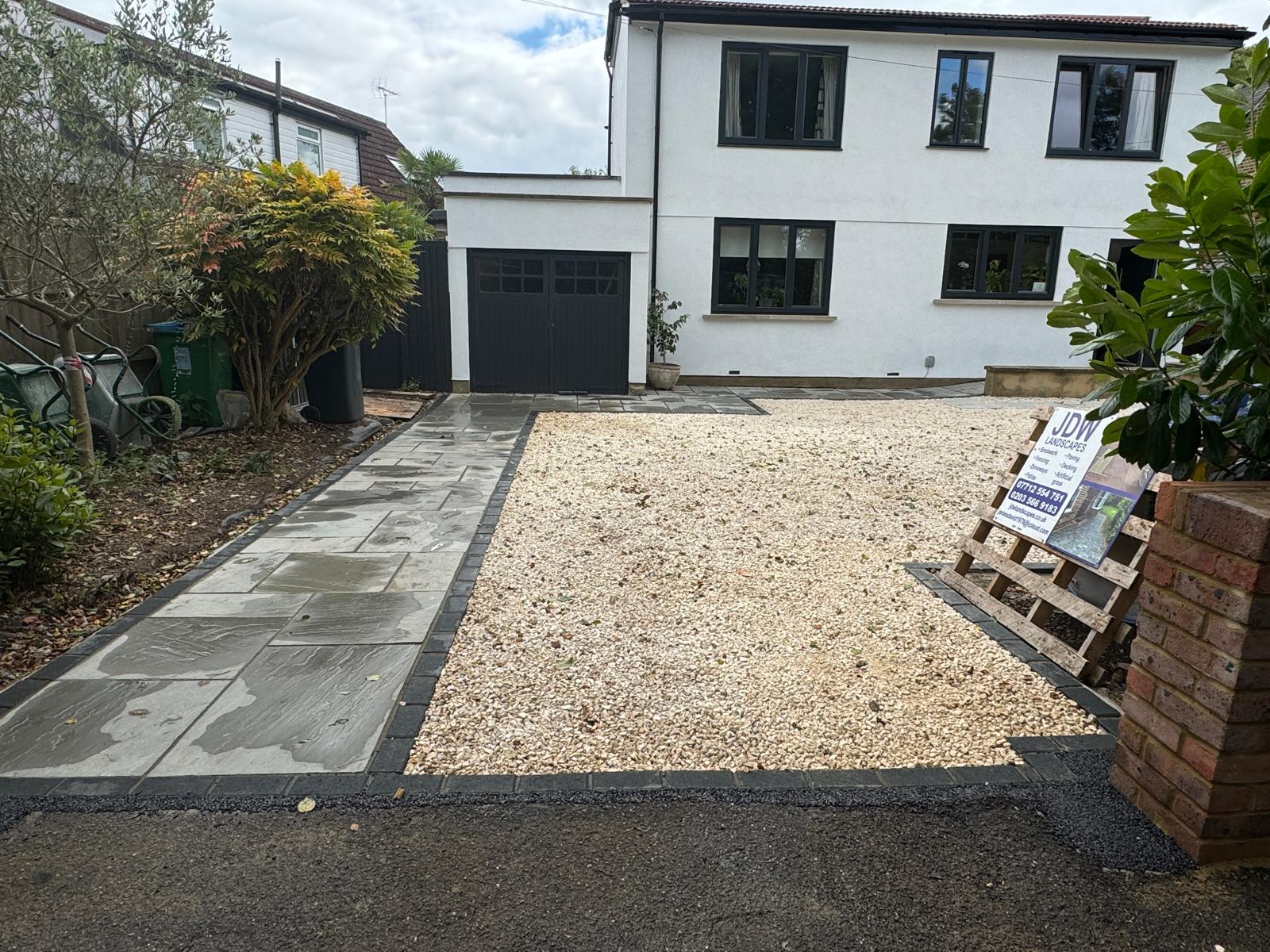 Gravel driveway with sandstone path and charcoal edging, Surrey
